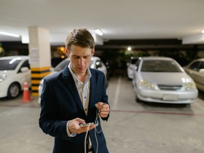 Young handsome businessman in the parking lot